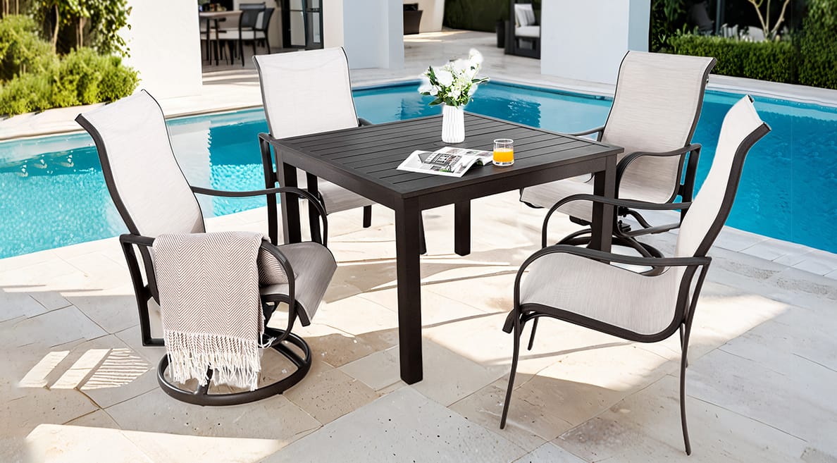 Luxurious San Tropez Dining Furniture featuring Modern Post-Leg Support Table and High-back Swivel Rockers - Crafted in Aluminum with Phifer Sling - Life Outside